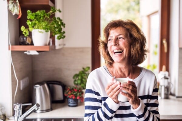 Middle-aged lady laughing