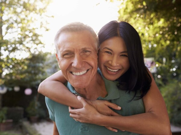 smiling-middle-aged-couple-enjoying-outside-600×450 QuantumRF 10 Logo